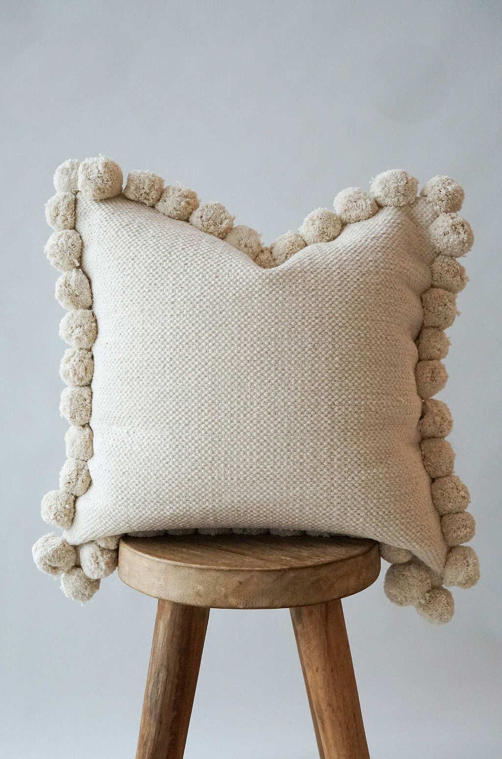Luma Pom Pom Cushion in White