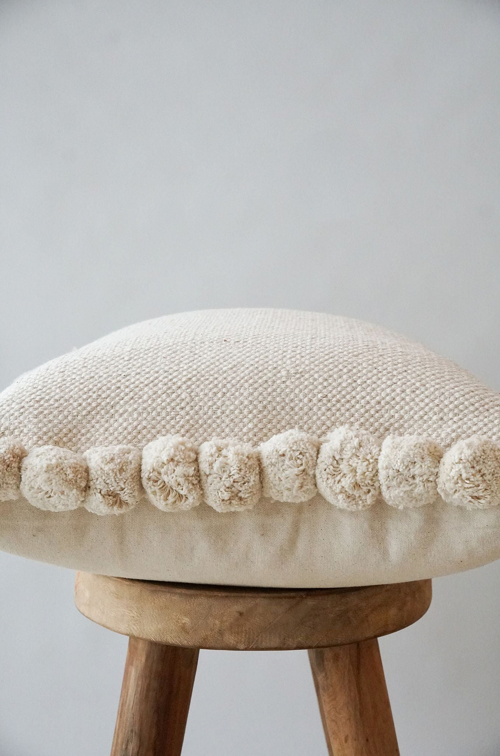 Luma Pom Pom Cushion in White