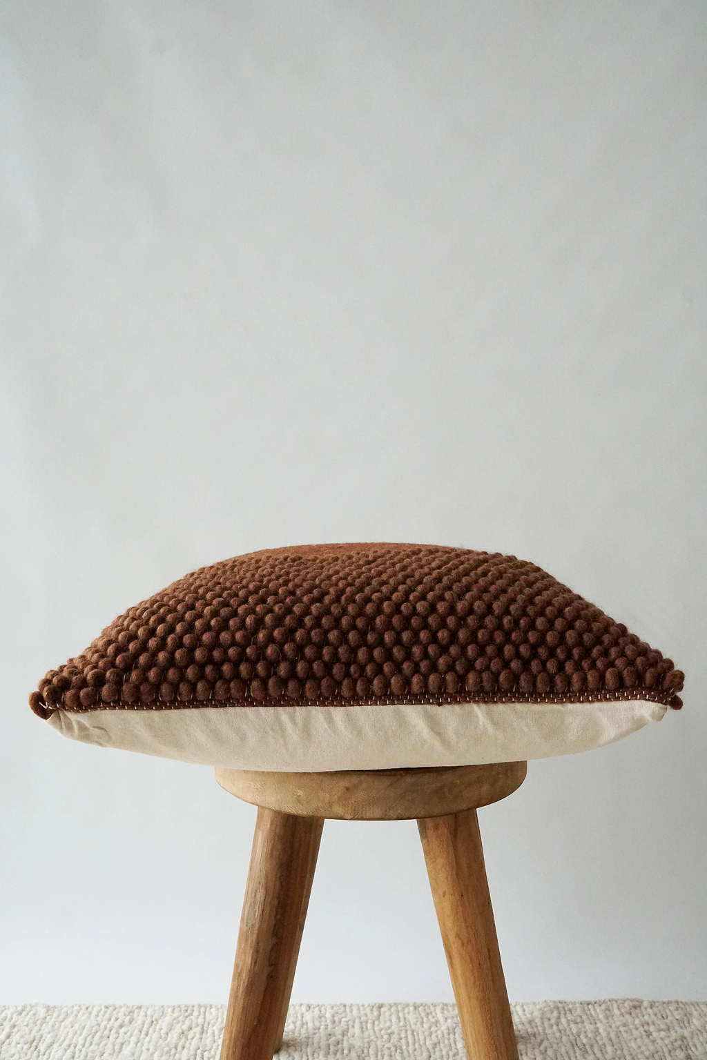Niva Looped Cushion in Rust