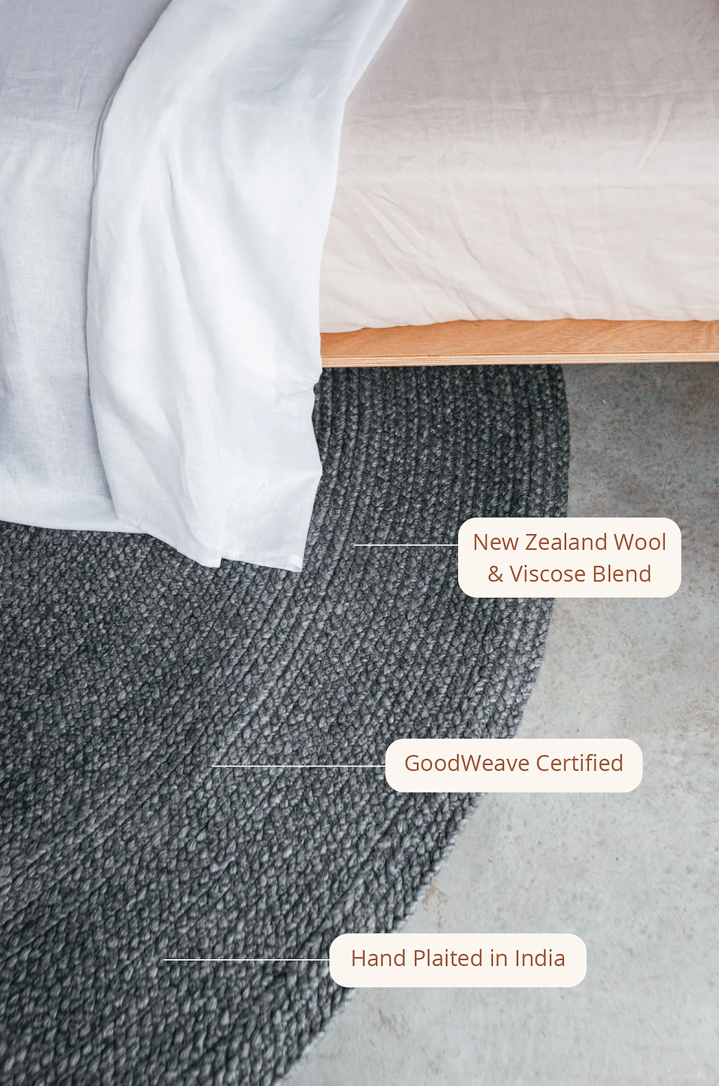 Jiva Round Braided Wool Rug in Charcoal