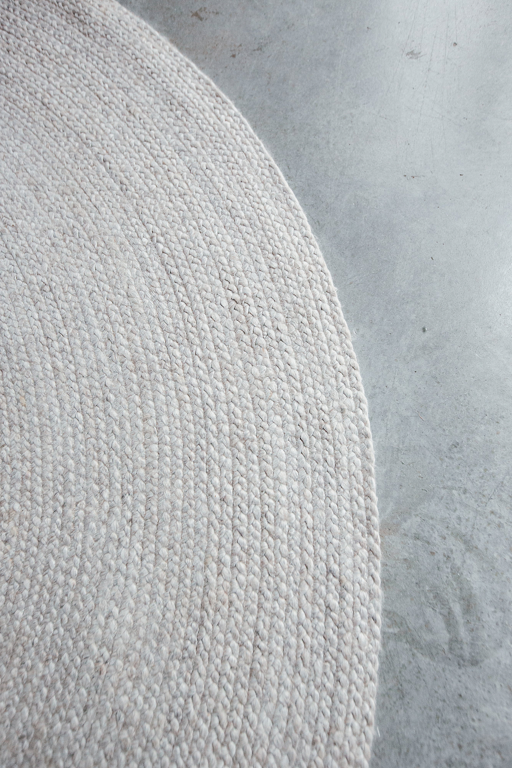 Jiva Round Braided Wool Rug in Ivory Beige