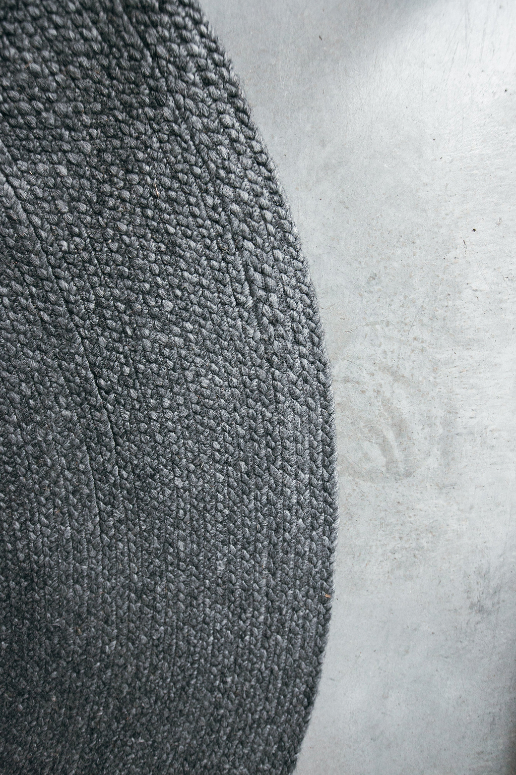 Sample of Jiva Round Braided Wool Rug in Charcoal