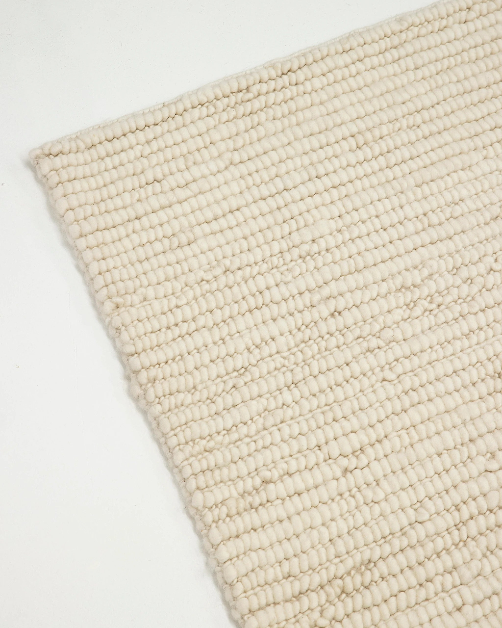 Sample of Bangalow Undyed New Zealand Wool Rug in White