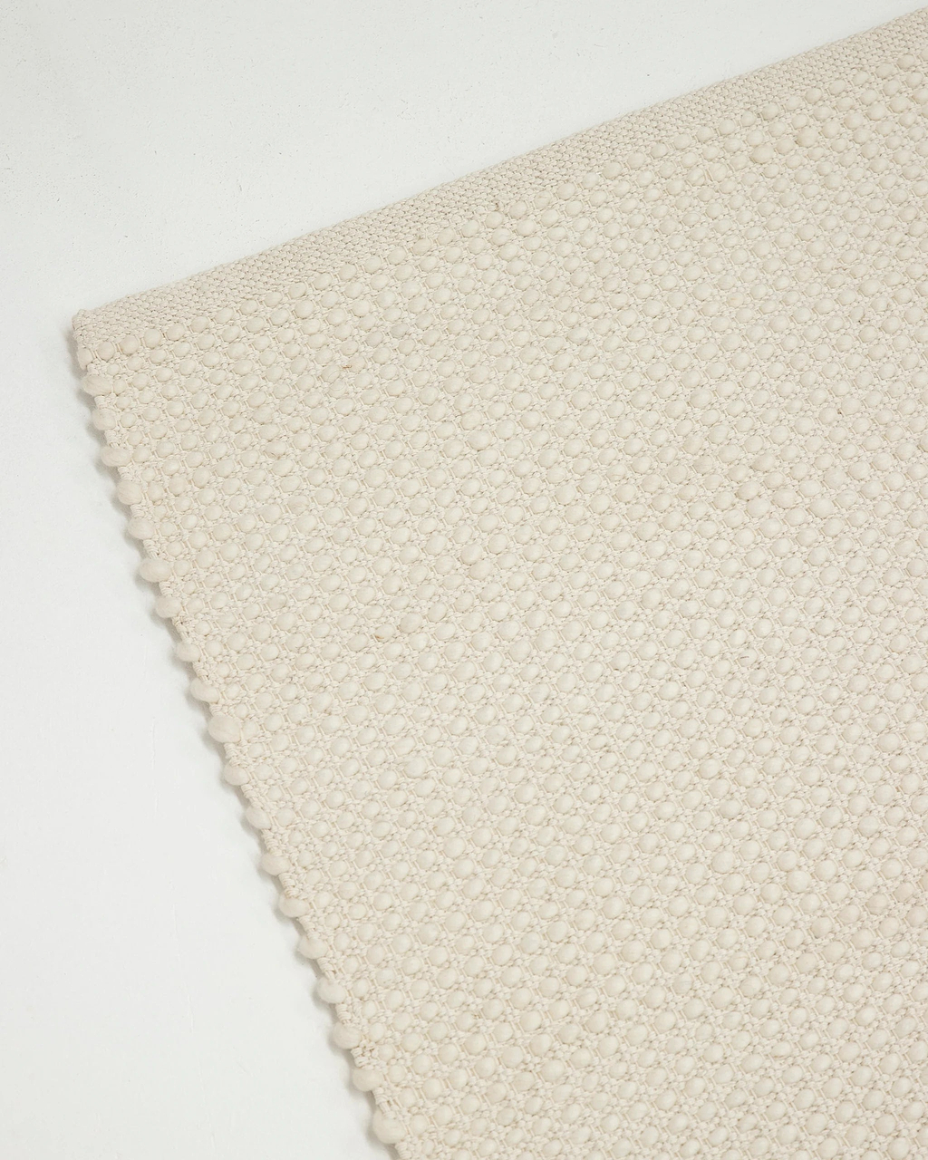 Sample of Soma Wool Rug in Ivory