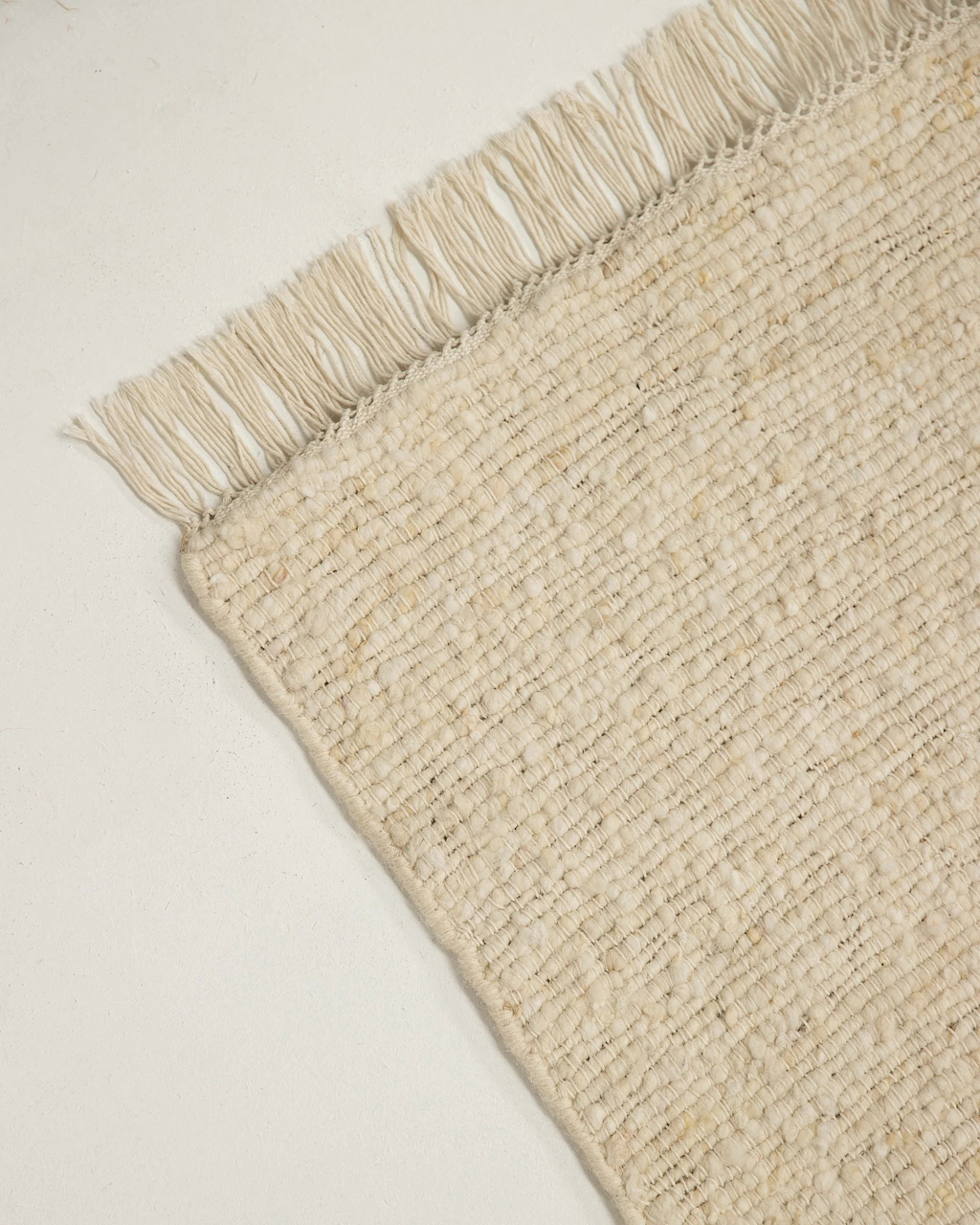 Sample of Kiva Hand Woven Wool Rug in Ivory