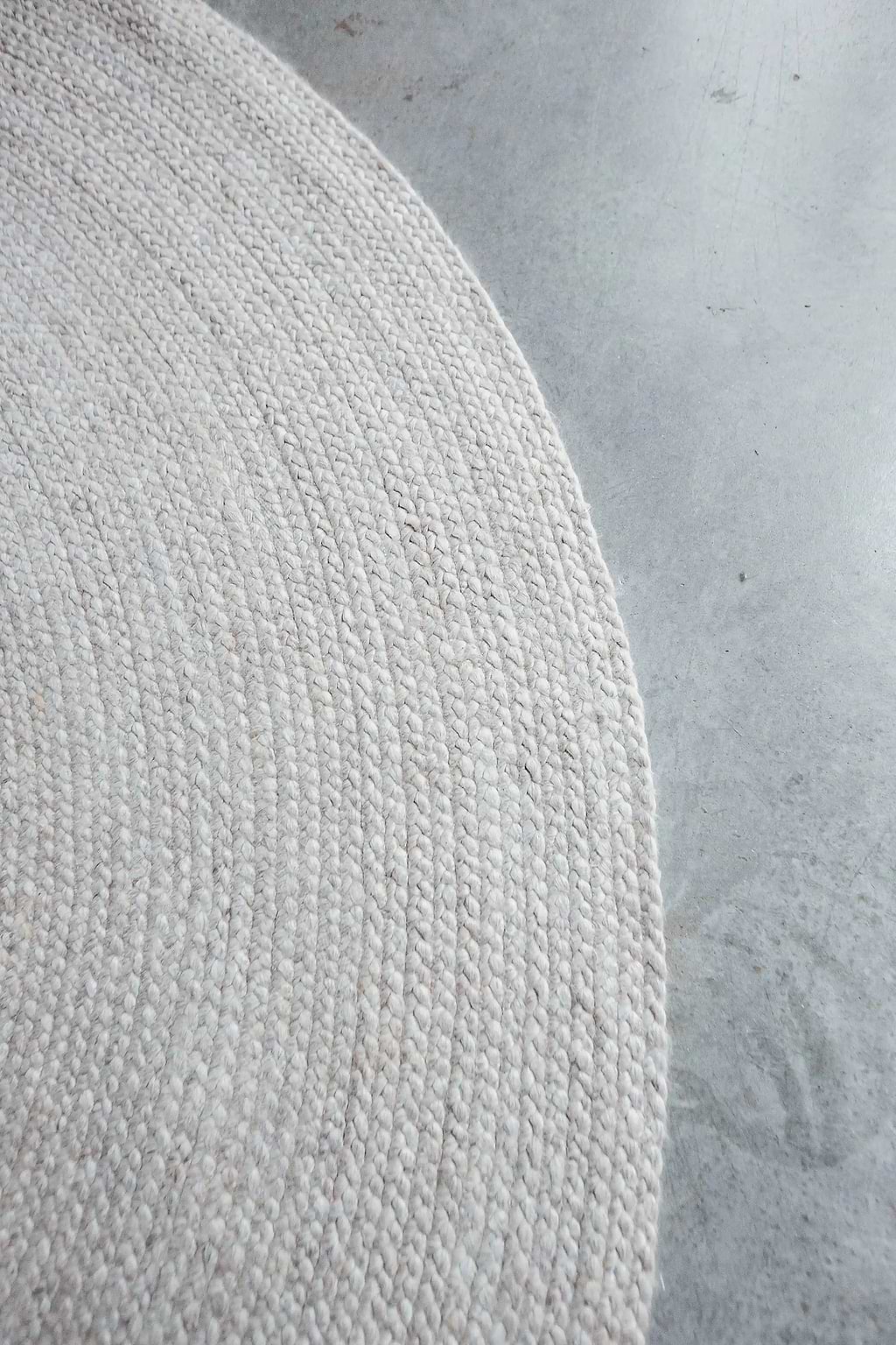 Jiva Round Braided Wool Rug in Ivory Beige