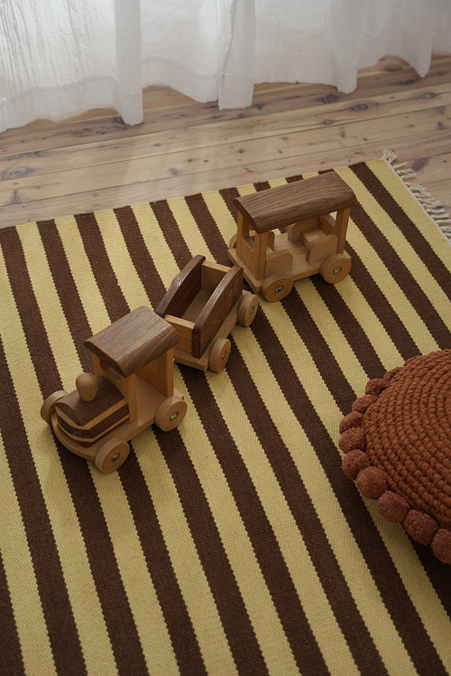 Solstice Striped Reversible Wool Rug in Choc Banana