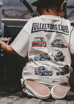 Child wearing a 'Collectors Club' t-shirt with cars.