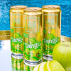 Three Au Vodka Tango Apple cans with water droplets, next to a whole and sliced green apple