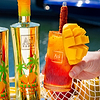 Au Vodka Miami Mango bottle and cocktail with mango garnish and chili-lime straw