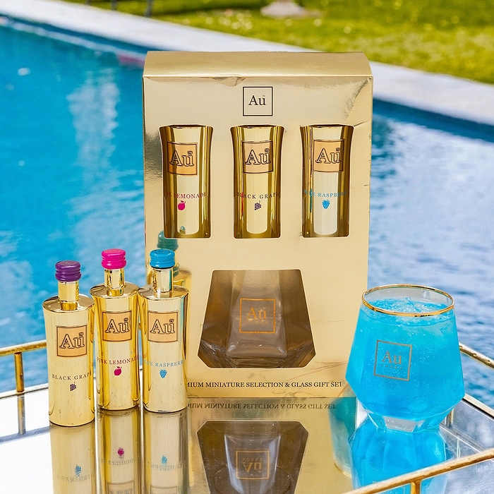 Au Vodka miniature selection and glass gift set with three bottles and a blue drink