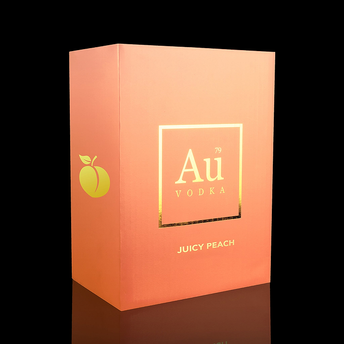 Au Vodka Juicy Peach gift box with gold branding and peach graphic