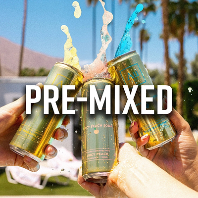 Three hands holding Au Vodka cocktail cans, with liquid splashing out, against a sunny outdoor background