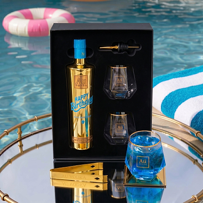 Au Vodka USA Happy Birthday Blue Raspberry Gift Pack with two glasses, pourer, and tongs