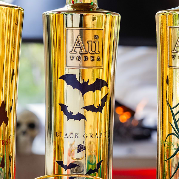 Au Vodka Black Grape bottle with bat graphics
