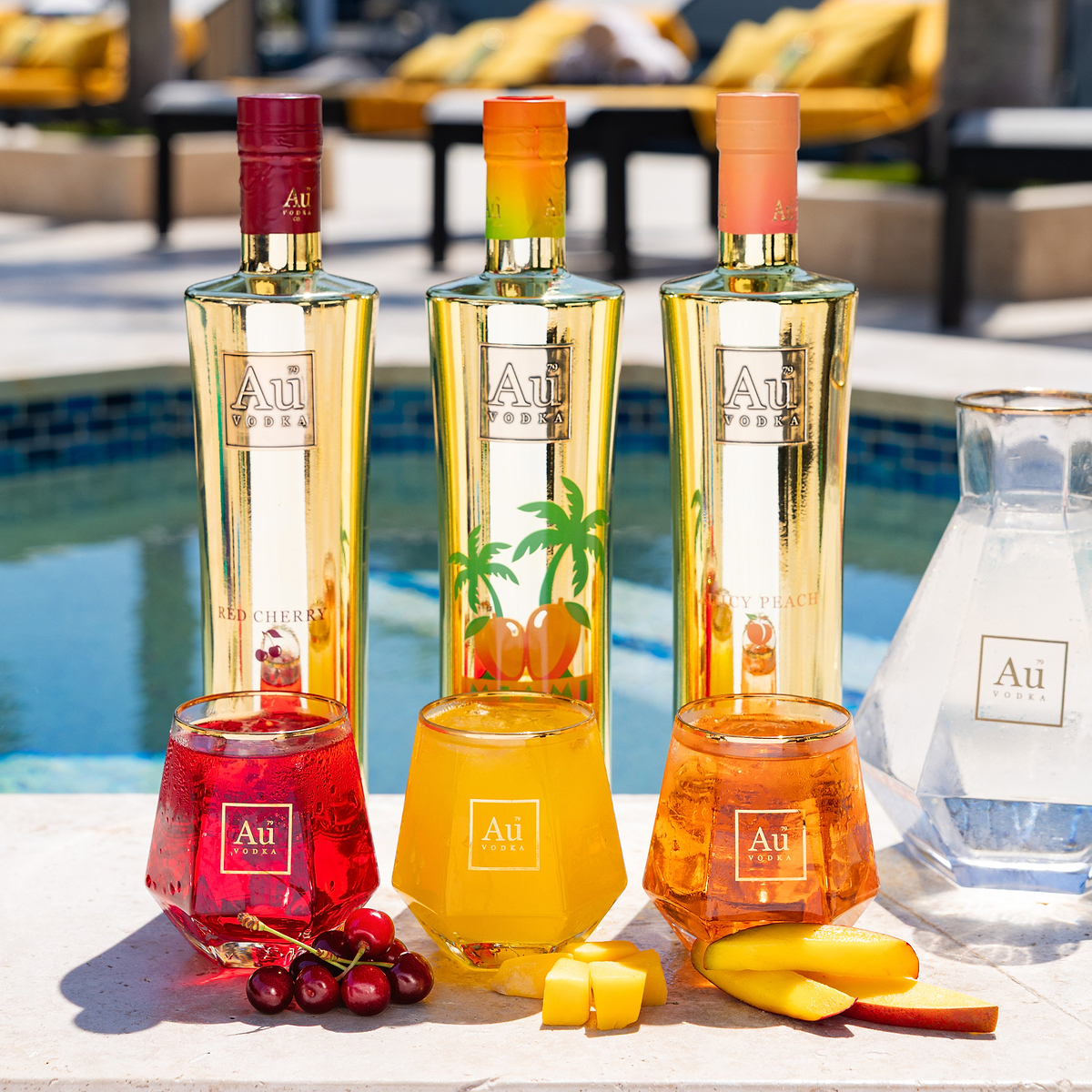 Au Vodka USA Red Cherry, Miami Mango, and Juicy Peach vodka bottles with matching cocktails