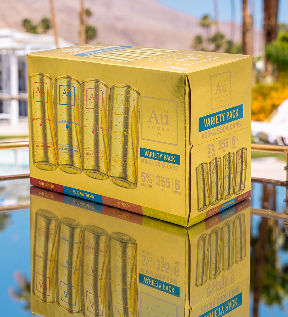 Au Vodka Soda Cans Variety Pack on a reflective surface