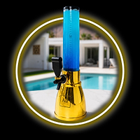 Au Vodka gold base drink dispenser with blue liquid, 0.5L/17oz markings, and a black tap