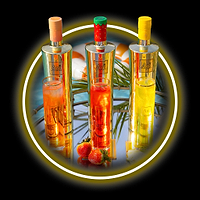 Three Au Vodka bottles and drinks on a tray, with a pool and palm leaves in the background