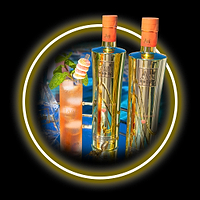 Two Au Vodka Juicy Peach bottles and a cocktail with mint and peach ring garnish