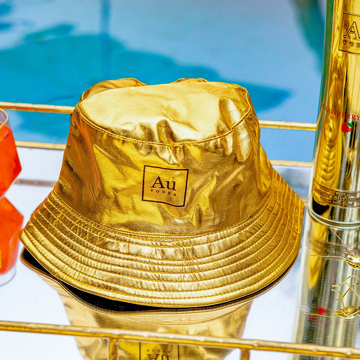 Au Vodka merchandise gold bucket hat with brand logo