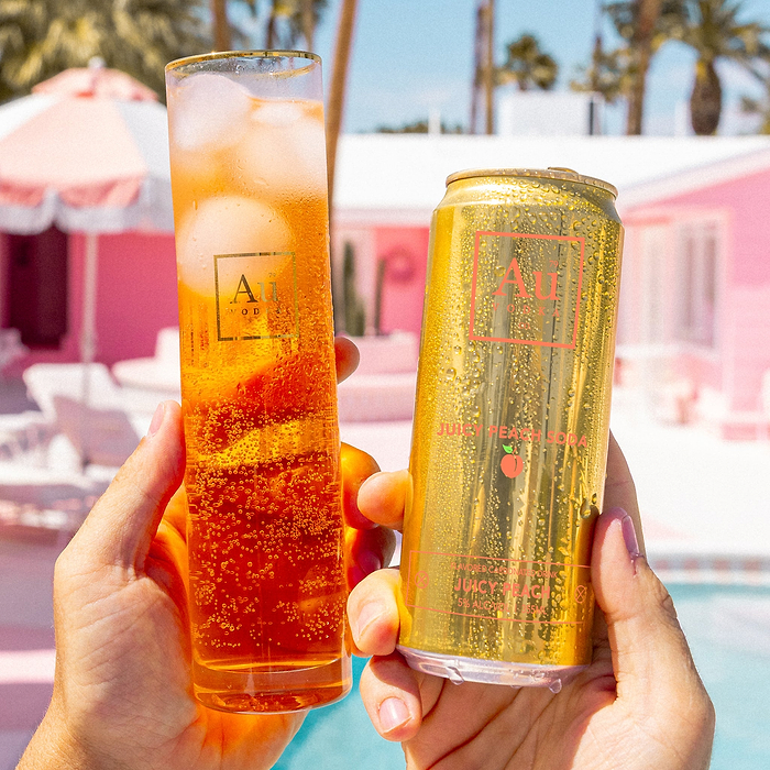 Au Vodka USA Black Grape Soda can and glass