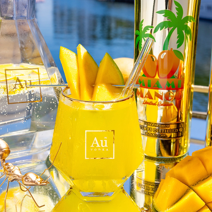 Au Vodka Miami Mango Limited Edition Gift Pack with a mango cocktail