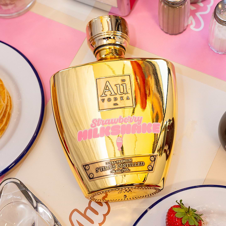 Au Vodka Strawberry Milkshake bottle in a bundle with glassware