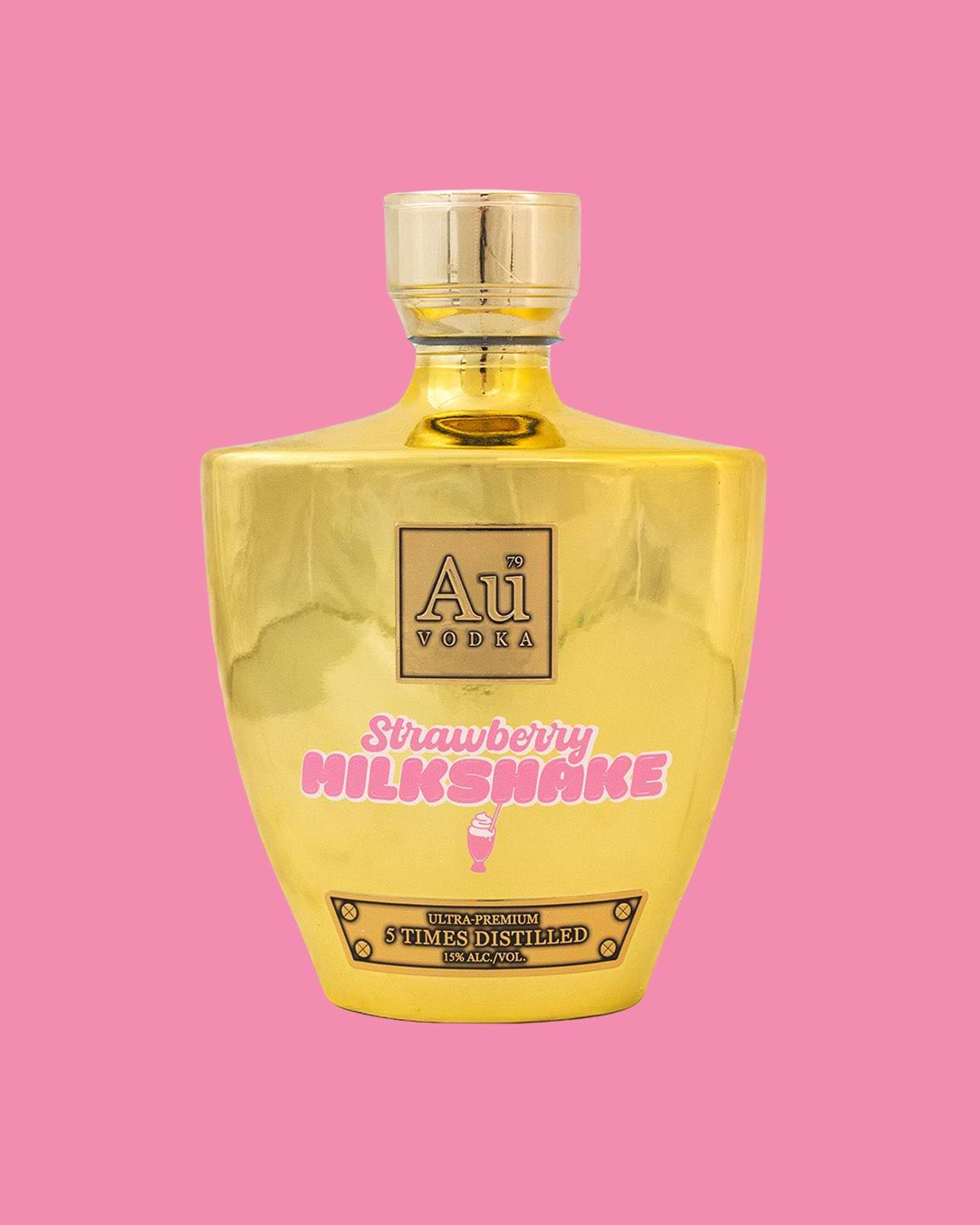 Au Vodka Strawberry Milkshake gold bottle against a pink background
