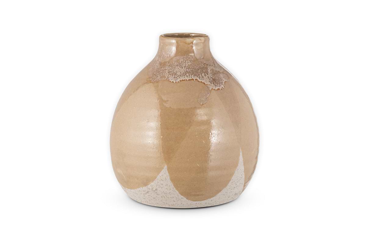 The nkuku Lucia Ceramic Vase - Terracotta Mix features a small, rounded shape with a narrow opening, finished in glossy beige glaze and cream patterns for a handcrafted look, all set against a plain white background.