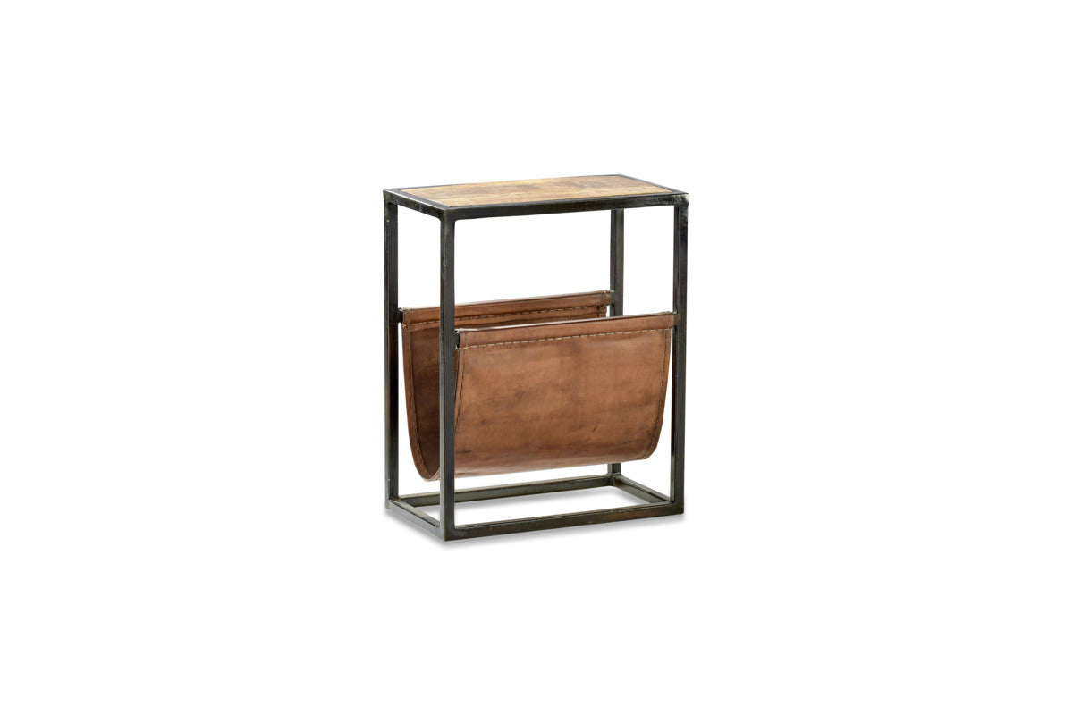 The nkuku Alera Side Table features a black iron frame, a rustic wood top, and two brown leather magazine holders suspended between its legs.