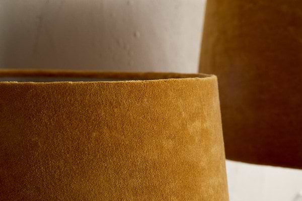 Close-up of nkukus Batakha Velvet & Linen Lampshade in Dark Ochre against a neutral background, showcasing its rich color and soft texture—an elegant lighting accent for any space.