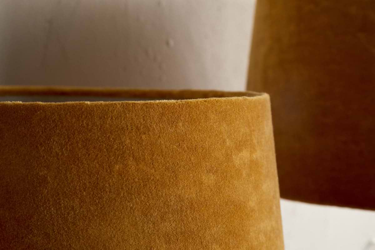 Close-up of nkukus Batakha Velvet & Linen Lampshade in Dark Ochre against a neutral background, showcasing its rich color and soft texture—an elegant lighting accent for any space.