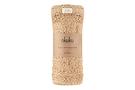 The nkuku Braided Hemp Table Runner (35 x 180cm), with its beige natural texture and artisan charm, is wrapped in a brown paper label and brings ethical, handmade style to any tablescape.