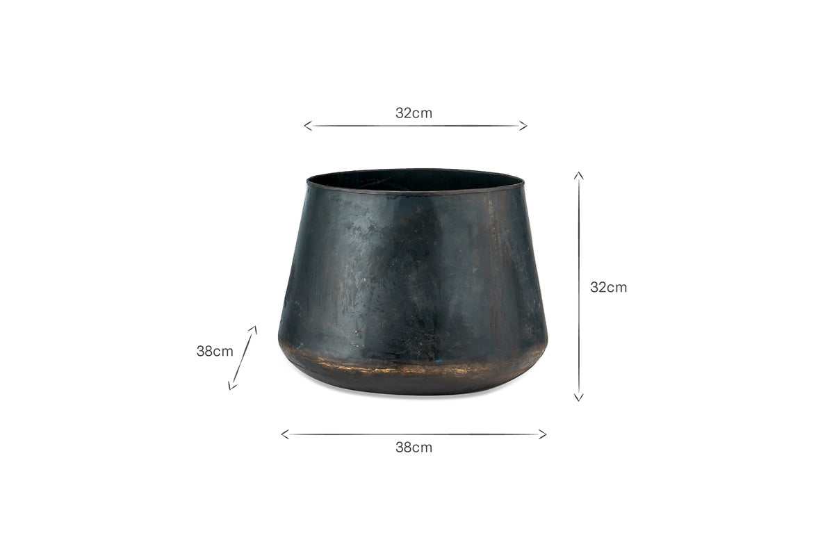 The Endo Reclaimed Iron Planter by nkuku is a wide, black planter made from recycled iron with a slightly tapered design; 32cm tall, 38cm wide at the base, and 32cm at the top, shown against a white background with measurement arrows.