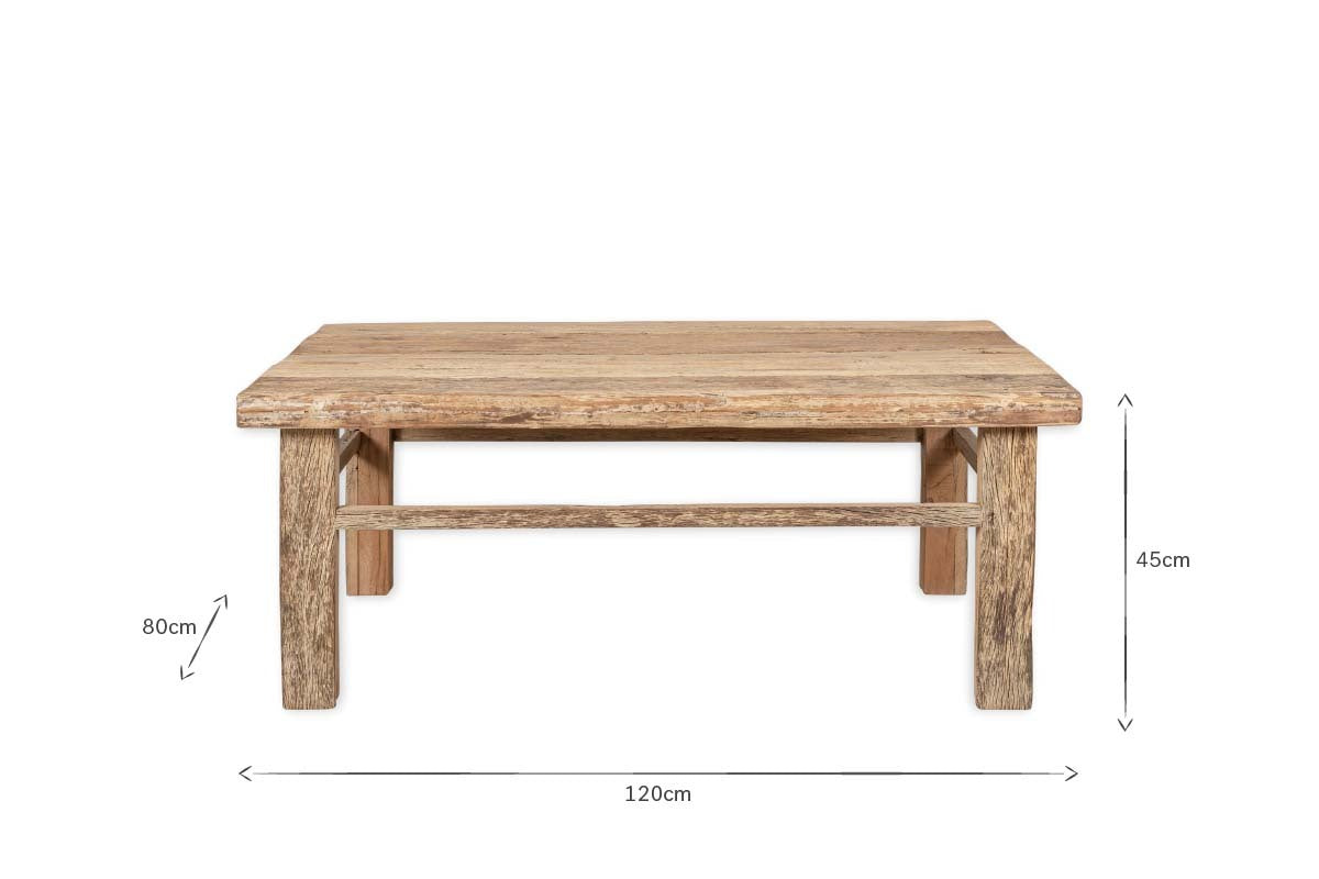 The Ibo Reclaimed Wood Coffee Table - Natural by nkuku is a rectangular rustic table with a weathered finish, four sturdy legs, and a support bar. Indian craftsmanship stands out. Dimensions: 120cm W x 80cm D x 45cm H, marked with arrows.