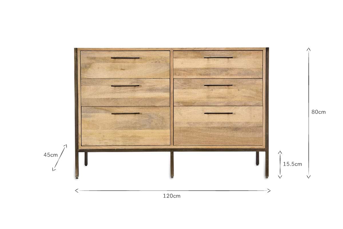 The Dasai Mango Wood Chest of Drawers by nkuku features six spacious drawers, metal handles, slim black legs (15.5cm high), and a light mango wood finish. Dimensions: 80cm H x 120cm W x 45cm D—perfect for adding minimalist style to your bedroom.