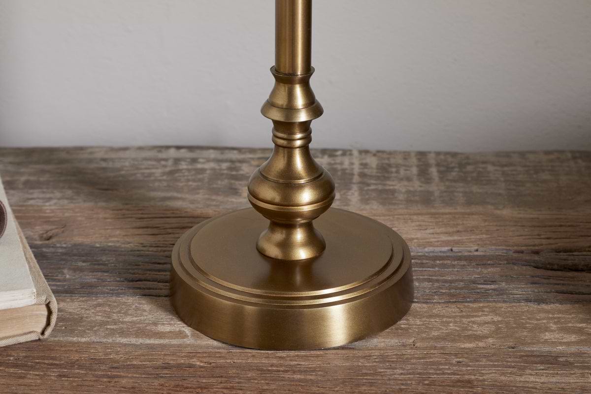 A close-up of the Ehadi Antique Table Lamp in antique brass by nkuku.