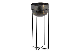 The Endo Reclaimed Iron Planter Stand by nkuku features a round, dark iron planter with gold veining in a sleek black metal stand on four tall legs, offering a modern and elegant way to display your favorite indoor plants.