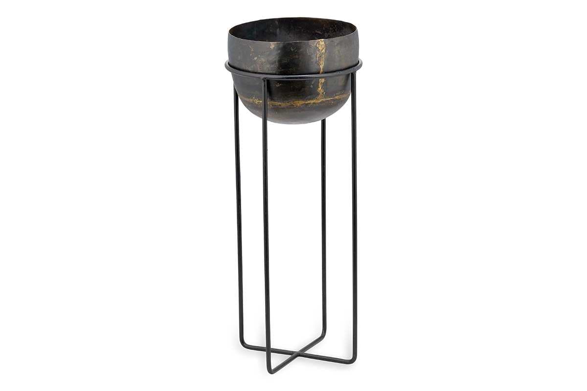 The Endo Reclaimed Iron Planter Stand by nkuku features a round, dark iron planter with gold veining in a sleek black metal stand on four tall legs, offering a modern and elegant way to display your favorite indoor plants.