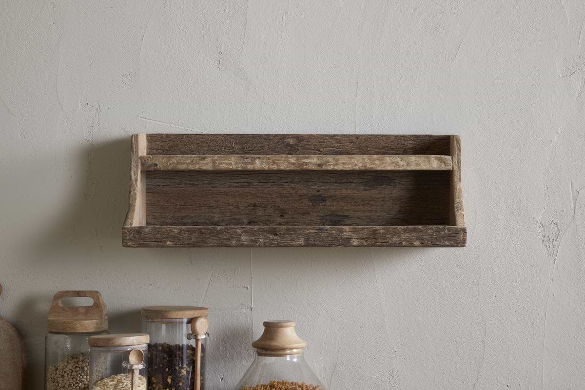 The nkuku Ibo Reclaimed Wood Storage Shelf - Natural brings rustic charm and practical kitchen storage to any space with its weathered wood design and wall-hung style.