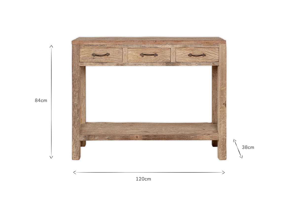 The nkuku Ibo Reclaimed Wood 3 Drawer Console Table – Natural has metal handles, a weathered finish, 3 drawers, and a lower shelf. Dimensions: H84 x W120 x D38 cm. Measurement arrows highlight size.
