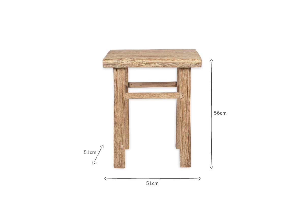 The nkuku Ibo Reclaimed Wood Side Table – Natural features Indian artisan craftsmanship with a rectangular seat, four straight legs, and a natural, unfinished look. Dimensions: 56 cm tall, 51 cm wide/deep; includes measurement arrows for reference.