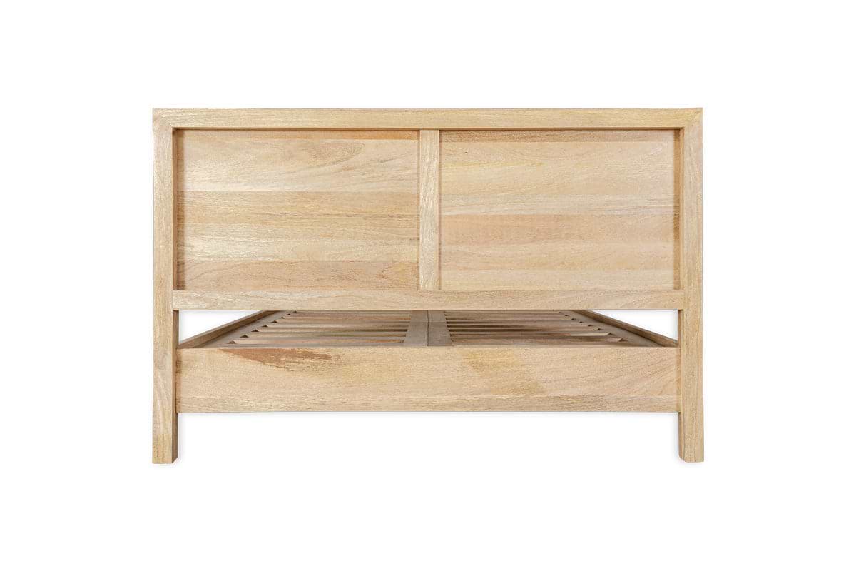 The nkuku Indali Mango Wood Bed - Natural features a rectangular light mango wood headboard with simple vertical and horizontal panels, visible slats, and straight edges for a minimalist, timeless look when viewed from the foot end.