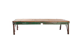 The Ishan Reclaimed Folding Dining & Coffee Table by nkuku showcases a rustic rectangular wooden top with a woven surface and green metal folding legs, featuring visible wear and chipping paint against a plain white background.