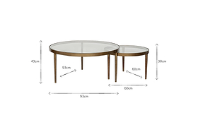 The nkuku Jiya Iron & Glass Nested Coffee Tables feature two round tables with glass tops and slim brass-finished legs. Large: 93cm x 43cm; Small: 60cm x 38cm.
