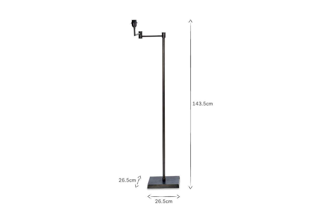 The Kara Iron Floor Lamp by nkuku showcases a slender, minimal design with a bronze finish and rectangular base. Standing 143.5 cm tall, it's photographed on a white background to highlight its modern elegance.