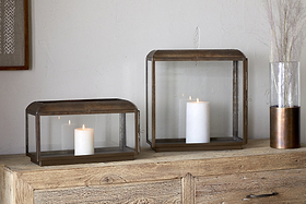 The nkuku Kiwanda Wide Lantern in Antique Brass brings elegant candlelight décor, seamlessly blending timeless charm with modern style.