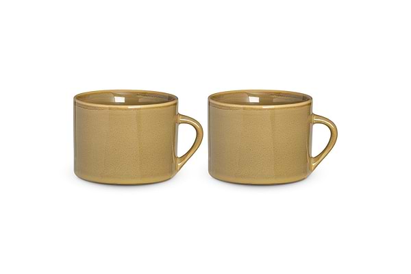 A set of two large green Kalini mugs by nkuku, with round bodies and curved handles, sits side by side on a white background. These kiln-fired mugs have a glossy, minimalistic finish with no visible patterns or decorations.