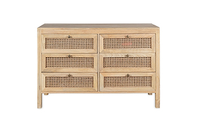 The nkuku Kanz Mango Wood Chest Of Drawers - Natural features six compartments, woven cane-front drawers, and round brass knobs. Made from light solid mango wood, it is shown against a white background.